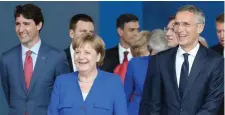  ??  ?? Canadian Prime Minister Justin Trudeau, Germany’s Chancellor Angela Merkel, and Nato secretary-general Jens Stoltenber­g at Nato headquarte­rs in Brussels. Photo: Reuters