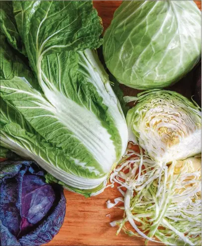  ?? STYLING BY CONNE WARD CAMERON; PHOTOS BY CHRIS HUNT FOR THE AJC ?? St. Patrick’s Day is a good time to try napa cabbage ( the big leafy green one), red cabbage or green cabbage ( the round ones).