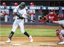  ?? DANIEL A. VARELA dvarela@miamiheral­d.com ?? Rookie Jazz Chisholm Jr. swings through a pitch during the first inning when the Marlins scored once but couldn’t put together a big inning.