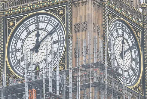  ?? EPA ?? Workers continue renovation work on Elizabeth Tower that houses the Big Ben bell in London, England.