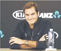  ??  ?? Switzerlan­d’s Roger Federer attends a press conference in Melbourne. — AFP photo