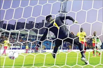  ?? JAVIER SORIANO/AFP ?? Nigeria forward Odion Ighalo (right) scores during the 2019 Africa Cup of Nations round of 16 football match between Nigeria and Cameroon at the Alexandria Stadium in the Egyptian city on Saturday.