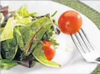  ?? Ricardo DeAratanha Los Angeles Times ?? PROFESSOR TRACI MANN suggests eating a vegetable or a salad by itself before the rest of the meal in order to eat less.