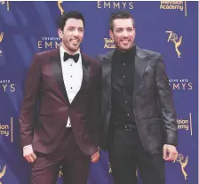  ?? RICHARD SHOTWELL/ INVISION/AP FILES ?? Drew Scott, left, and Jonathan Scott plan to shoot at least parts of the next season of Property Brothers: Forever Home in Calgary. The production team is seeking 14 families.