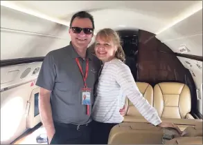  ?? Contribute­d photo ?? Mark Morrow, left with his wife, Dunja Morrow, right. Pilot Mark Morrow, 57, of Danbury, was one of four people killed in a plane crash in Farmington on Thursday.