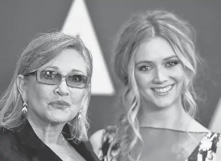  ?? STRAUSS/ INVISION/ AP JORDAN ?? Carrie Fisher and her daughter, actress Billie Lourd, attend the Governors Awards in Los Angeles in 2015.