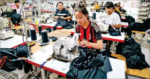  ?? HONG CHIVOAN ?? Some 256 garment factories have suspended operations, affecting over 130,000 workers.