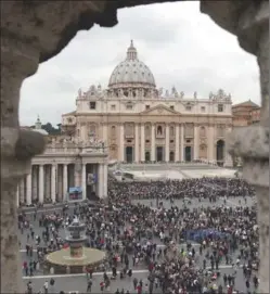  ??  ?? People gather in St. Peter’s Square at the Vatican. Audiences with the Pope draw thousands of people and take place on Wednesday mornings.