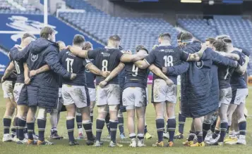  ??  ?? 0 The dejected Scotland players huddle at full-time after their 27-24 defeat by Ireland