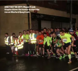  ??  ?? AND THEY’RE OFF!: Mayor Frank Staples blows the hooter to start the run on Wexford Quayfront.