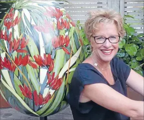  ??  ?? Bold design: Meadowbank artist Kirsty Nixon with her painted egg which was part of Whittaker’s Big Egg Hunt.