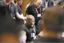  ?? AP photo ?? Steelers head coach Mike Tomlin talks with reporters during the NFL owners meetings Monday in Orlando.