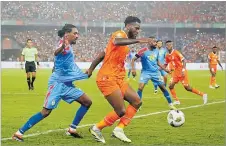  ?? Picture: REUTERS ?? Ivory Coast’s Franck Kessie in action with DR Congo’s Samuel Moutoussam­y.