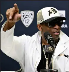  ?? MATTHEW JONAS — DAILY CAMERA ?? Colorado Buffaloes’ head coach Deion Sanders speaks during a spring football media day at the Champions Center at the University of Colorado Boulder on March 20.