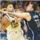  ?? JED JACOBSOHN/AP ?? Warriors guard Stephen Curry, left, shoots against Mavericks guard Luka Doncic during Game 2 on Friday.