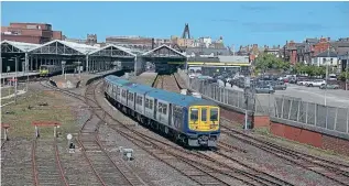  ?? FRED KERR ?? Above After numerous delays, Class 769 bi-mode units are entering service with Northern. On May 19, set No. 769424 eases away from Southport on a service to Stalybridg­e.