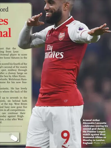  ?? Photo: VCG ?? Arsenal striker Alexandre Lacazette celebrates scoring his second goal during the Premier League match against West Bromwich Albion on Monday in London, England.