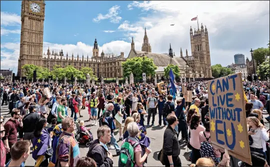  ??  ?? Europhiles: Tens of thousands of Remain supporters marched to Parliament Square to protest against the referendum result