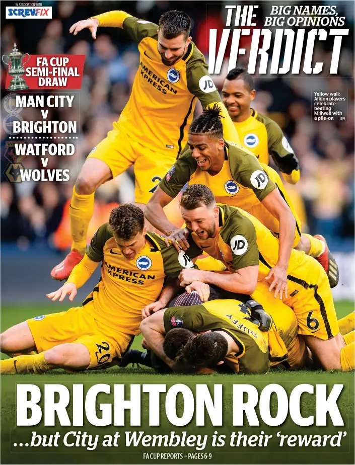  ?? BPI ?? Yellow wall: Albion players celebrate beating Millwall with a pile-on