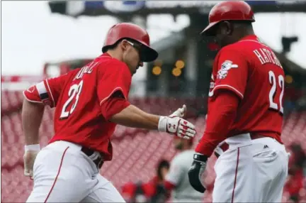  ?? JOHN MINCHILLO — THE ASSOCIATED PRESS ?? The Cincinnati Reds’ Adam Duvall (23) rounds third base after blasting a two-run home run off Philadelph­ia Phillies pitcher Adam Morgan in the seventh inning of Thursday’s game in Cincinnati. The Reds won 7-4.