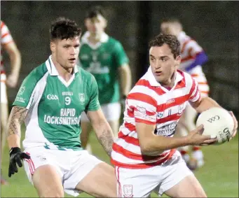  ??  ?? The movements of Tommy Dwyer (Ferns St. Aidan’s) are tracked by Graham Carty (St. Mary’s).