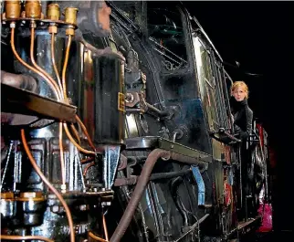  ??  ?? Sarah Ferguson with the steam train that will be transforme­d as part of her North Pole Express Christmas experience.