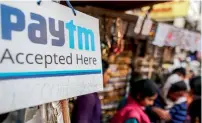  ?? — Bloomberg ?? Paytm got a huge boost in 2016 after India’s government moved to eliminate most of the nation’s paper money.