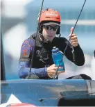  ?? EZRA SHAW/ GETTY IMAGES ?? Emirates Team New Zealand helmsman Peter Burling gives the thumbs up after beating Oracle Team USA skippered by Jimmy Spithill in race 8.