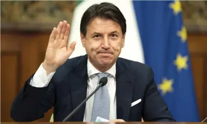  ?? Photograph: Italian Prime Minister's Press O/AFP/Getty Images ?? Giuseppe Conte, who recently survived confidence votes, will hold a cabinet meeting before officially handing in his resignatio­n.