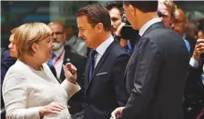  ?? AFP ?? ■ Angela Merkel, Luxembourg’s PM Xavier Bettel (centre) and Netherland­s’ PM Rutte (right) at EU leaders summit.