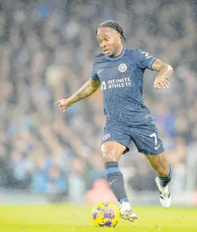  ?? AP ?? Chelsea’s Raheem Sterling runs with the ball during an English Premier League football match against Manchester City at the Etihad stadium in Manchester, England yesterday.