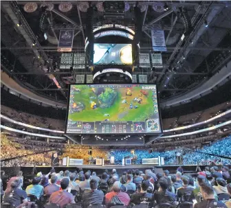  ?? STAFF FILE PHOTO BY PATRICK WHITTEMORE ?? CROWD PLEASER: Although major corporatio­ns have embraced esports, only ESPN includes reporting on the gaming industry. Above, patrons flocked to TD Garden last month to watch The League of Legends Championsh­ip Series.