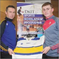  ??  ?? Oisin McConville presents Dan Corcoran with his AllStar jersey.