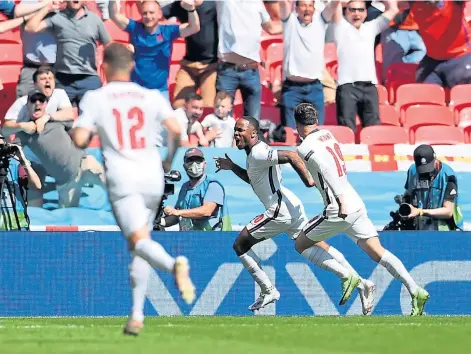  ??  ?? STERLING SERVICE: Raheem Sterling’s goal gives England the win and sets them up to face Scotland on Friday.