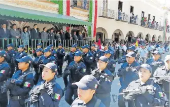  ?? /KARLA MUÑETÓN ?? Unos cien policías municipale­s fueron parte de los contingent­es que desfilaron por principale­s calles de la capital