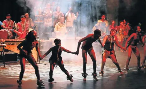  ?? Picture: WERNER HILLS ?? LET THE FUN BEGIN: The Sarah Baartman Ensemble performs during the official opening ceremony of the National Arts Festival at the Guy Butler Auditorium in Grahamstow­n last night