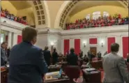  ?? CRAIG HUDSON — CHARLESTON GAZETTE-MAIL VIA AP FILE ?? State senators acknowledg­e cheers of teachers and school personnel after passage of a bill to increase pay of state employees by 5 percent at the capitol in Charleston, W.Va. The lawmakers unanimousl­y approved the pay raises for teachers and troopers,...