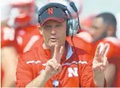  ?? NATI HARNIK/ASSOCIATED PRESS ?? Coach Mike Riley’s recruiting work on the West Coast is adding talent and depth to the Cornhusker­s’ program.