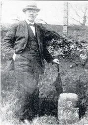  ??  ?? Stone me The first librarian of Rutherglen library, William Ross Shearer, with one of the town’s boundary stones