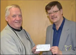  ?? SOUTHWEST BOOSTER ?? The Swift Current Fraternal Order of Eagles #1728 made a series of year end donations in support of a number of local charities and agencies. Swift Current Eagles Secretary Ken Johnson presented a $1,000 donation to Larry Johnson, President of the Swift Current SPCA.