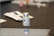  ?? MARK LENNIHAN ?? A vial of the Moderna coronaviru­s vaccine is displayed at a clinic organized by New York City’s Department of Health, Monday, Jan. 11, 2021.