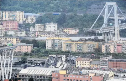  ?? PHOTO: REUTERS ?? Destructio­n . . . The collapsed Morandi Bridge is seen in the Italian port city of Genoa.