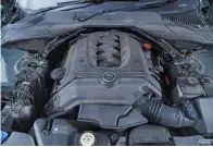  ?? ?? LEFT 3.5 litre V8 supplies a satisfacto­ry warbling symphony on demand.