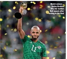  ?? ?? Match winner… Yacine Brahimi lifts the Golden Ball award after netting in the final
