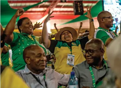  ?? AFP ?? Delegates celebrate results during the African National Congress 54th National Conference in Johannesbu­rg on Monday. —