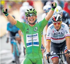  ??  ?? Mark Cavendish celebrates his 32nd career Tour stage victory.