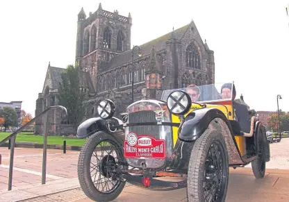  ??  ?? Ready for the off: Andrew Goodfellow and Derek Coghill in the open-top 1930 Austin 7.