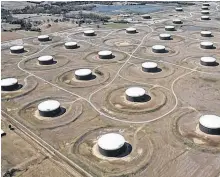  ?? REUTERS ?? Crude oil storage tanks are seen from above at the Cushing oil hub, in Cushing, Oklahoma, March 24, 2016.