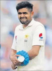  ?? REUTERS ?? Babar Azam scored a gritty 68 before retiring hurt after being struck by England’s Ben Stokes on Friday.
