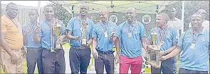  ?? (File pic) ?? REPS Pool Club posing for a group photo with some of their trophies from last season in the Dixie’s Internatio­nal Pool League and Knockout. The league defending champions meet tough Way Inn tomorrow.